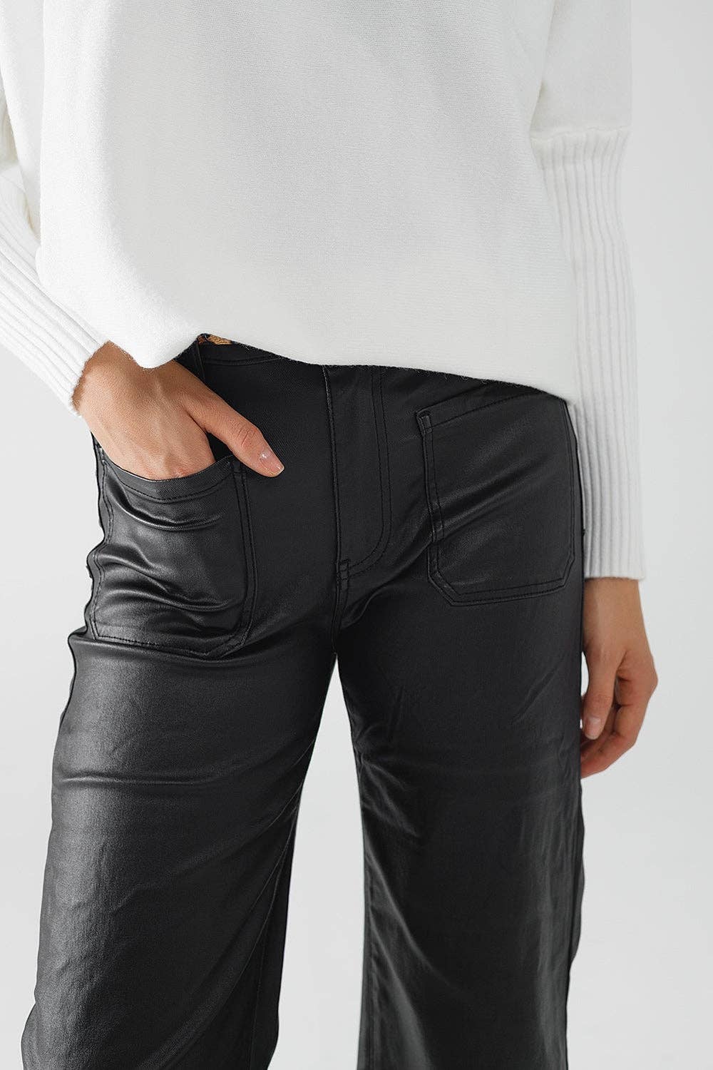 Faux leather pants with wide leg and pocket detail: Black