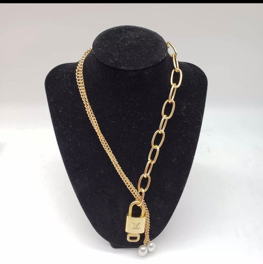 Louis Vuitton Lock and Key on gold tone chain with pearl accents